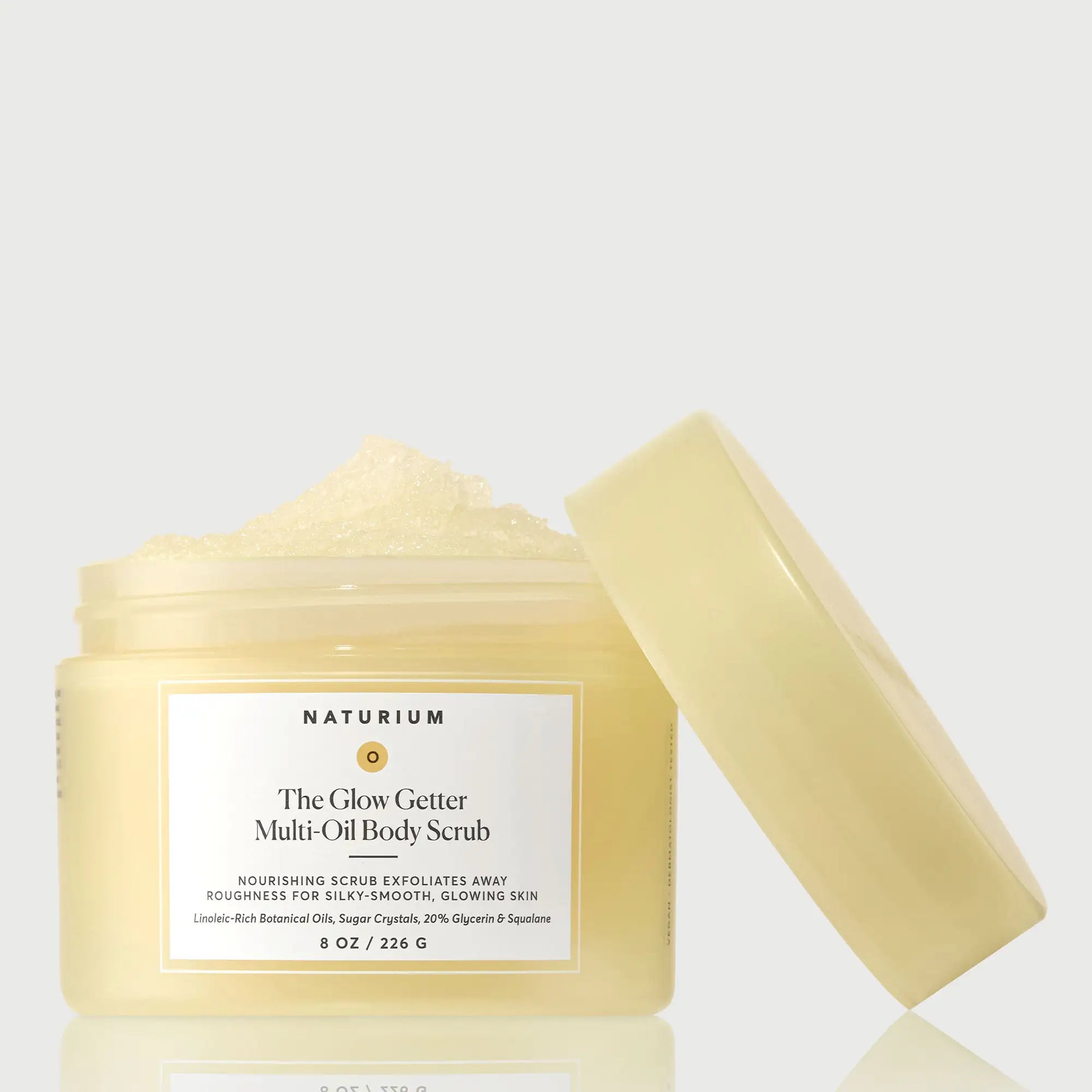the-glow-getter-multi-oil-body-scrub-n6 NATR-40028-GlowGetter-Multi-Oil-Body-Scrub-Front-CapOff-bonebkgd.webp